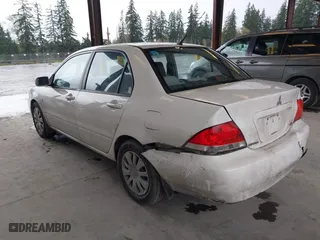2006 Mitsubishi Lancer ES with VIN JA3AJ26E86U060513, listed as a IAAI auction lot 41980244 with 154,379 mi miles. Bid and sale history available at carsss.com. Image 3.