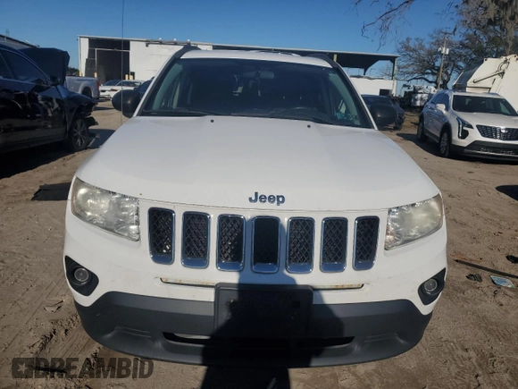 2012 Jeep Compass Latitude with VIN 1C4NJDEB4CD537763, listed as a Copart auction lot 84878244 with 198,582 mi miles and Clean Title. Bid and sale history available at DreamBid. Image 5.