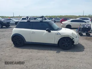 2007 MINI Hardtop S with VIN WMWMF73547TV31403, listed as a IAAI auction lot 42066433 with 156,730 mi miles and . Bid and sale history available at DreamBid. Image 14.