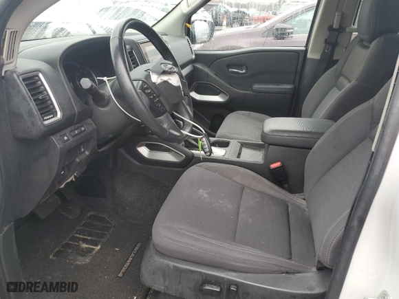 2023 Nissan Frontier PRO-4X with VIN 1N6ED1EK6PN657177, listed as a Copart auction lot 52156285 with 27,115 mi miles and Salvage Title. Bid and sale history available at carsss.com. Image 7.