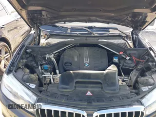 2014 BMW X5 xDrive35d with VIN 5UXKS4C57E0J93982, listed as a IAAI auction lot 42085173 with 169,908 mi miles. Bid and sale history available at carsss.com. Image 10.