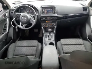 2014 Mazda CX-5 Touring with VIN JM3KE2CY8E0424757, listed as a Copart auction lot 54703195 with 111,401 mi miles and Salvage Title. Bid and sale history available at DreamBid. Image 8.
