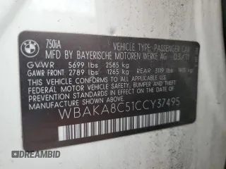 2012 BMW 7 Series 750i z VIN WBAKA8C51CCY37495, wystawiony jako Copart lot #56914295 z przebiegiem 126 697 mil mil oraz Tytuł czysty. Historia ofert i sprzedaży dostępna na DreamBid. Obrazek 12.