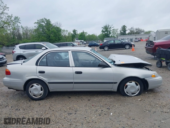 2001 Chevrolet Prizm z VIN 1Y1SK52851Z423703, wystawiony jako IAAI lot #42169702 z przebiegiem Nie podano mil oraz . Historia ofert i sprzedaży dostępna na DreamBid. Obrazek 14.