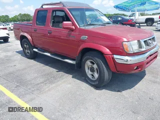 2000 Nissan Frontier XE z VIN 1N6ED27Y3YC382842, wystawiony jako IAAI lot #42343459 z przebiegiem 172 454 mil mil oraz . Historia ofert i sprzedaży dostępna na DreamBid. Obrazek 1.