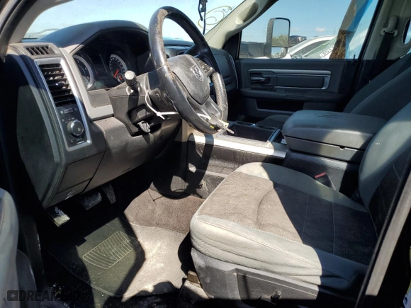 2014 Ram 2500 SLT with VIN 3C6UR5DL9EG145475, listed as a Copart auction lot 68456504 with 210,277 mi miles and Salvage Title. Bid and sale history available at carsss.com. Image 7.