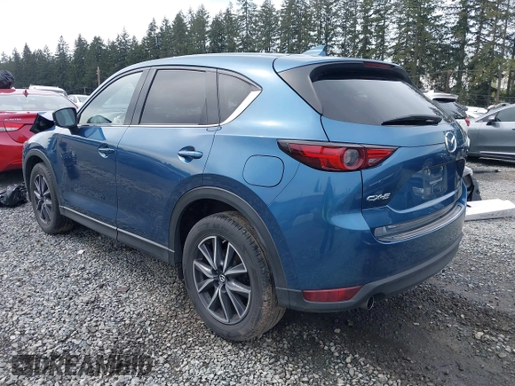 2017 Mazda CX-5 Grand Touring with VIN JM3KFADL5H0100146, listed as a IAAI auction lot 41997181 with 80,071 mi miles. Bid and sale history available at carsss.com. Image 3.