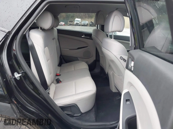 2018 Hyundai Tucson SE with VIN KM8J23A48JU794382, listed as a IAAI auction lot 41947971 with 69,615 mi miles. Bid and sale history available at carsss.com. Image 8.