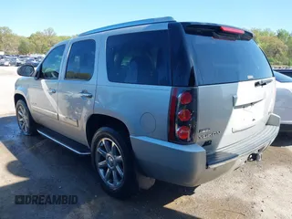 2010 GMC Yukon Denali with VIN 1GKUKEEF8AR104016, listed as a IAAI auction lot 42004250 with 274,459 mi miles. Bid and sale history available at carsss.com. Image 3.