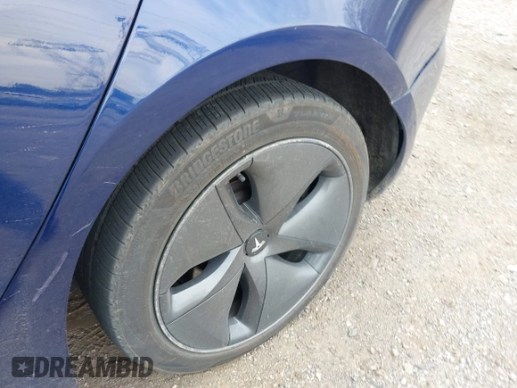 2018 Tesla Model 3 Long Range Battery with VIN 5YJ3E1EB2JF056166, listed as a IAAI auction lot 41847972 with 126,126 mi miles and . Bid and sale history available at DreamBid. Image 12.