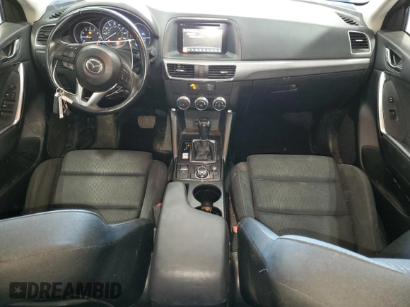 2016 Mazda CX-5 Touring with VIN JM3KE4CY3G0716346, listed as a Copart auction lot 51467895 with 133,218 mi miles and Salvage Title. Bid and sale history available at carsss.com. Image 8.