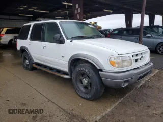 2000 Ford Explorer XLT z VIN 1FMZU73E2YZB82279, wystawiony jako Copart lot #86607864 z przebiegiem 46 620 mil mil oraz Szkody całkowita. Historia ofert i sprzedaży dostępna na DreamBid. Obrazek 4.