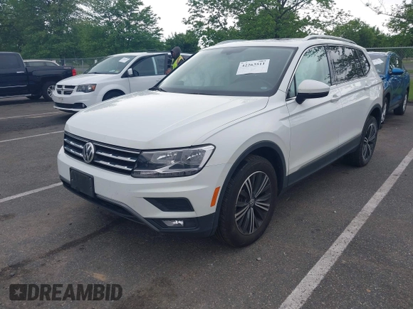 2018 Volkswagen Tiguan SEL with VIN 3VV2B7AX4JM012840, listed as a IAAI auction lot 42263511 with 105,510 mi miles and . Bid and sale history available at DreamBid. Image 2.