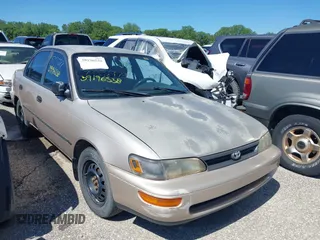 1993 Toyota Corolla DLX z VIN 1NXAE09E2PZ068805, wystawiony jako IAAI lot #39196538 z przebiegiem 237 959 mil mil oraz . Historia ofert i sprzedaży dostępna na DreamBid. Obrazek 1.