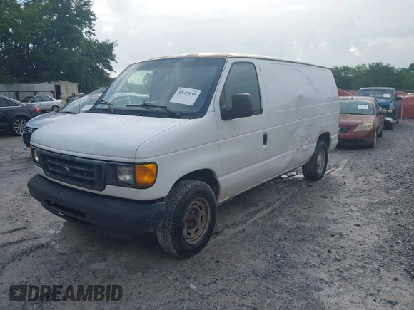 2005 Ford Econoline Cargo with VIN 1FTRE14W65HA89689, listed as a IAAI auction lot 42607059 with 260,935 mi miles and . Bid and sale history available at DreamBid. Image 2.