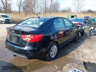 2012 Kia Forte EX with VIN KNAFU4A20C5545447, listed as a IAAI auction lot 41542267 with 157,782 mi miles. Bid and sale history available at carsss.com. Image 4.