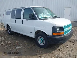 2005 Chevrolet Express Cargo Van with VIN 1GCGG25V451145263, listed as a IAAI auction lot 41474612 with 390,174 mi miles. Bid and sale history available at carsss.com. Image 1.