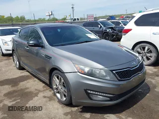 2013 Kia Optima SX z VIN 5XXGR4A63DG191299, wystawiony jako IAAI lot #42064932 z przebiegiem 174 025 mil mil oraz . Historia ofert i sprzedaży dostępna na DreamBid. Obrazek 1.