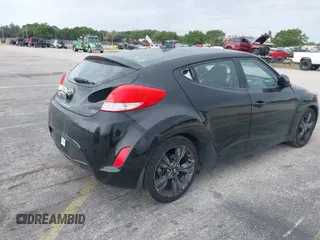 2017 Hyundai Veloster Value Edition with VIN KMHTC6AD9HU317347, listed as a IAAI auction lot 41800746 with 32,550 mi miles. Bid and sale history available at carsss.com. Image 4.