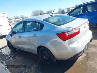 2014 Kia Rio LX with VIN KNADM4A35E6395218, listed as a IAAI auction lot 41614054 with 134,535 mi miles and . Bid and sale history available at DreamBid. Image 14.