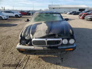 1998 Jaguar XJ with VIN SAJHX1245WC819762, listed as a Copart auction lot 81480174 with 132,491 mi miles and Salvage Title. Bid and sale history available at carsss.com. Image 5.