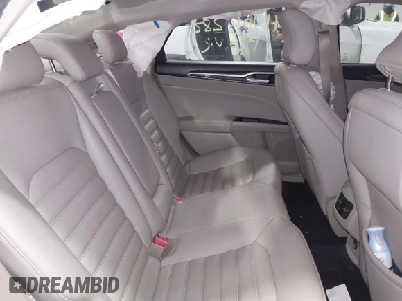 2019 Ford Fusion Hybrid SEL with VIN 3FA6P0MU8KR272811, listed as a IAAI auction lot 41705282 with 56,565 mi miles. Bid and sale history available at carsss.com. Image 8.