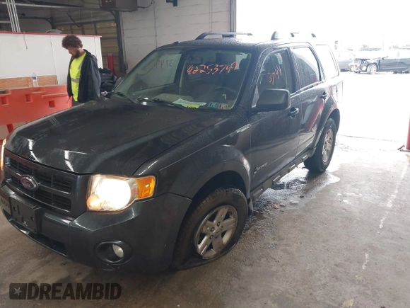 2009 Ford Escape Hybrid with VIN 1FMCU49339KB19700, listed as a IAAI auction lot 42253749 with 169,299 mi miles and . Bid and sale history available at DreamBid. Image 6.