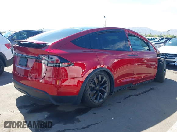 2023 Tesla Model X with VIN 7SAXCBE52PF416278, listed as a IAAI auction lot 42066747 with Not Provided miles and . Bid and sale history available at DreamBid. Image 4.