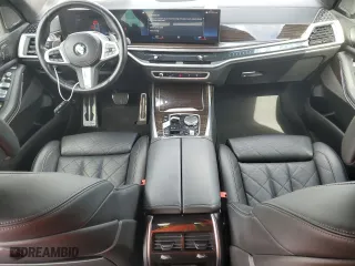 2023 BMW X7 xDrive40i with VIN 5UX23EM06P9M76099, listed as a Copart auction lot 54166385 with 67,400 mi miles and Clean Title. Bid and sale history available at carsss.com. Image 8.