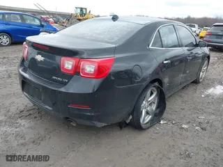 2013 Chevrolet Malibu LTZ with VIN 1G11J5SX6DF229593, listed as a IAAI auction lot 42016580 with 166,365 mi miles. Bid and sale history available at carsss.com. Image 4.