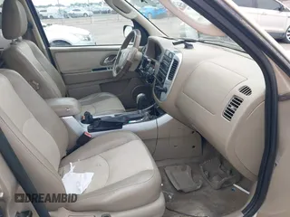2007 Mercury Mariner Luxury with VIN 4M2YU91187KJ14159, listed as a IAAI auction lot 42576802 with 166,027 mi miles and . Bid and sale history available at DreamBid. Image 5.