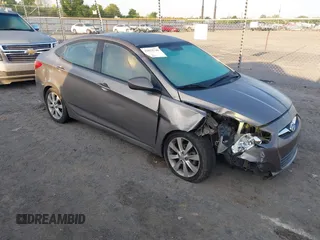 2012 Hyundai Accent GLS with VIN KMHCU4AE4CU097425, listed as a IAAI auction lot 42052740 with 244,705 mi miles. Bid and sale history available at carsss.com. Image 1.