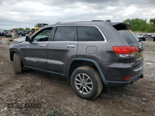 2014 Jeep Grand Cherokee Limited with VIN 1C4RJFBM1EC352484, listed as a Copart auction lot 57983305 with 157,143 mi miles and Salvage title. Bid and sale history available at DreamBid. Image 2.