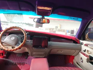 2003 Lincoln Town Car Cartier z VIN 1LNHM83WX3Y633077, wystawiony jako IAAI lot #42501273 z przebiegiem Nie podano mil oraz . Historia ofert i sprzedaży dostępna na DreamBid. Obrazek 15.