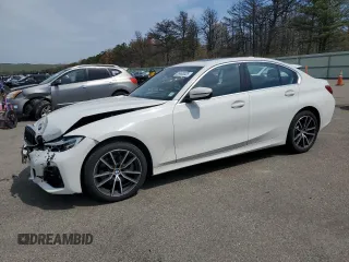 2019 BMW 3 Series 330i xDrive with VIN WBA5R7C51KFH02856, listed as a Copart auction lot 55463325 with 59,223 mi miles and Salvage title. Bid and sale history available at DreamBid. Image 1.