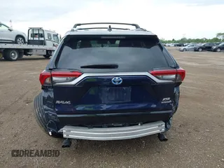 2021 Toyota RAV4 Hybrid XSE with VIN 4T3E6RFV0MU053245, listed as a IAAI auction lot 42426959 with 28,717 mi miles and . Bid and sale history available at DreamBid. Image 16.