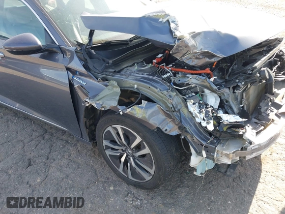 2020 Honda Accord Touring with VIN 1HGCV3F90LA013434, listed as a IAAI auction lot 42075502 with 56,645 mi miles and . Bid and sale history available at DreamBid. Image 6.
