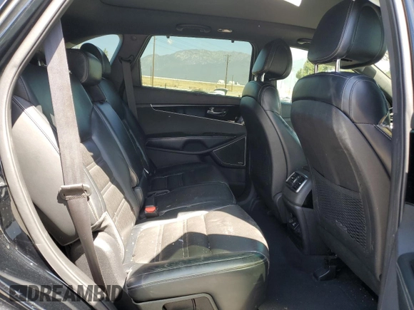 2016 Kia Sorento SXL z VIN 5XYPKDA19GG016449, wystawiony jako Copart lot #56943845 z przebiegiem 72 350 mil mil oraz Szkoda całkowita • Salvage title. Historia ofert i sprzedaży dostępna na DreamBid. Obrazek 11.