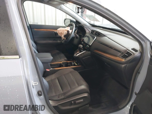 2020 Honda CR-V Touring z VIN 2HKRW2H90LH608435, wystawiony jako IAAI lot #42318256 z przebiegiem 32 602 mil mil oraz . Historia ofert i sprzedaży dostępna na DreamBid. Obrazek 5.