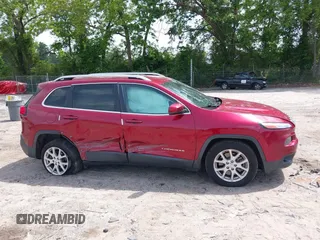 2016 Jeep Cherokee Latitude with VIN 1C4PJLCB8GW320099, listed as a IAAI auction lot 42236076 with 186,000 mi miles and . Bid and sale history available at DreamBid. Image 13.