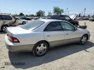 2000 Lexus ES 300 with VIN JT8BF28G9Y5100812, listed as a Copart auction lot 56790365 with 161,518 mi miles and Salvage title. Bid and sale history available at DreamBid. Image 3.