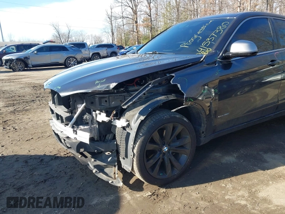 2019 BMW X6 xDrive35i z VIN 5UXKU2C51K0Z64589, wystawiony jako IAAI lot #41537380 z przebiegiem 60 769 mil mil oraz . Historia ofert i sprzedaży dostępna na DreamBid. Obrazek 6.