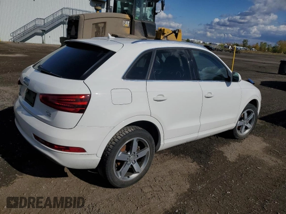 2015 Audi Q3 with VIN WA1EFEFS5FR009981, listed as a Copart auction lot 73714854 with 157,693 mi miles and Salvage title. Bid and sale history available at DreamBid. Image 3.