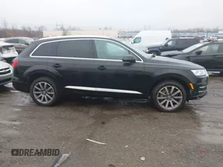 2019 Audi Q7 Premium with VIN WA1AHAF74KD029904, listed as a IAAI auction lot 41024012 with 79,896 mi miles and . Bid and sale history available at DreamBid. Image 13.