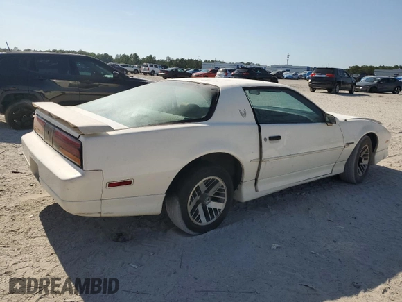 1989 Pontiac Firebird z VIN 1G2FS21S4KL260438, wystawiony jako Copart lot #57420155 z przebiegiem 132 101 mil mil oraz Czysty tytuł • Clean title. Historia ofert i sprzedaży dostępna na DreamBid. Obrazek 4.
