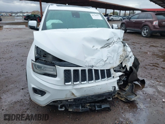 2014 Jeep Grand Cherokee Overland with VIN 1C4RJFCG9EC162098, listed as a IAAI auction lot 41746022 with 120,588 mi miles and . Bid and sale history available at DreamBid. Image 6.