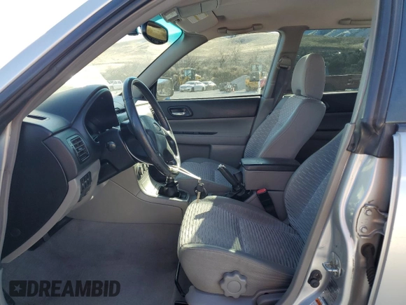 2003 Subaru Forester XS with VIN JF1SG65603G741030, listed as a Copart auction lot 46109315 with 154,469 mi miles and Salvage title. Bid and sale history available at DreamBid. Image 7.
