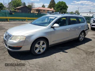 2009 Volkswagen Passat Komfort with VIN WVWXK73C59E035298, listed as a Copart auction lot 60121675 with 161,693 mi miles and Salvage title. Bid and sale history available at DreamBid. Image 1.