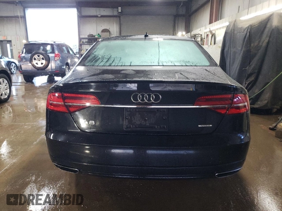 2017 Audi A8 z VIN WAU44AFD2HN014533, wystawiony jako Copart lot #46684705 z przebiegiem 94 030 mil mil oraz Szkody całkowita. Historia ofert i sprzedaży dostępna na DreamBid. Obrazek 6.