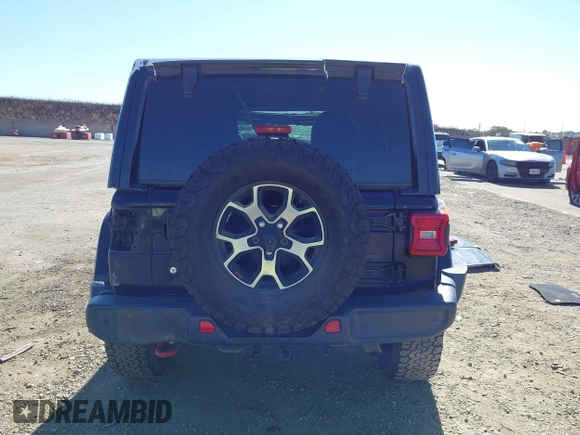 2018 Jeep Wrangler Unlimited Rubicon with VIN 1C4HJXFGXJW255881, listed as a IAAI auction lot 42316499 with 39,439 mi miles and . Bid and sale history available at DreamBid. Image 17.